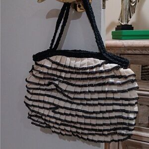 Chic Black and Cream Ruffled Shoulder Bag
